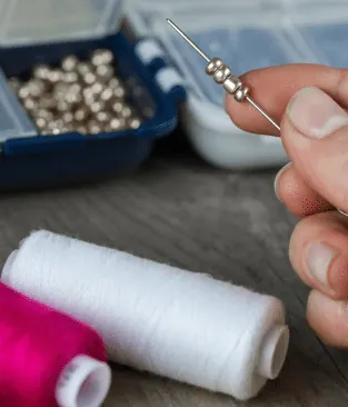 Sewing thread and needle